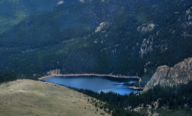 a distant reservoir and mountains from the cog